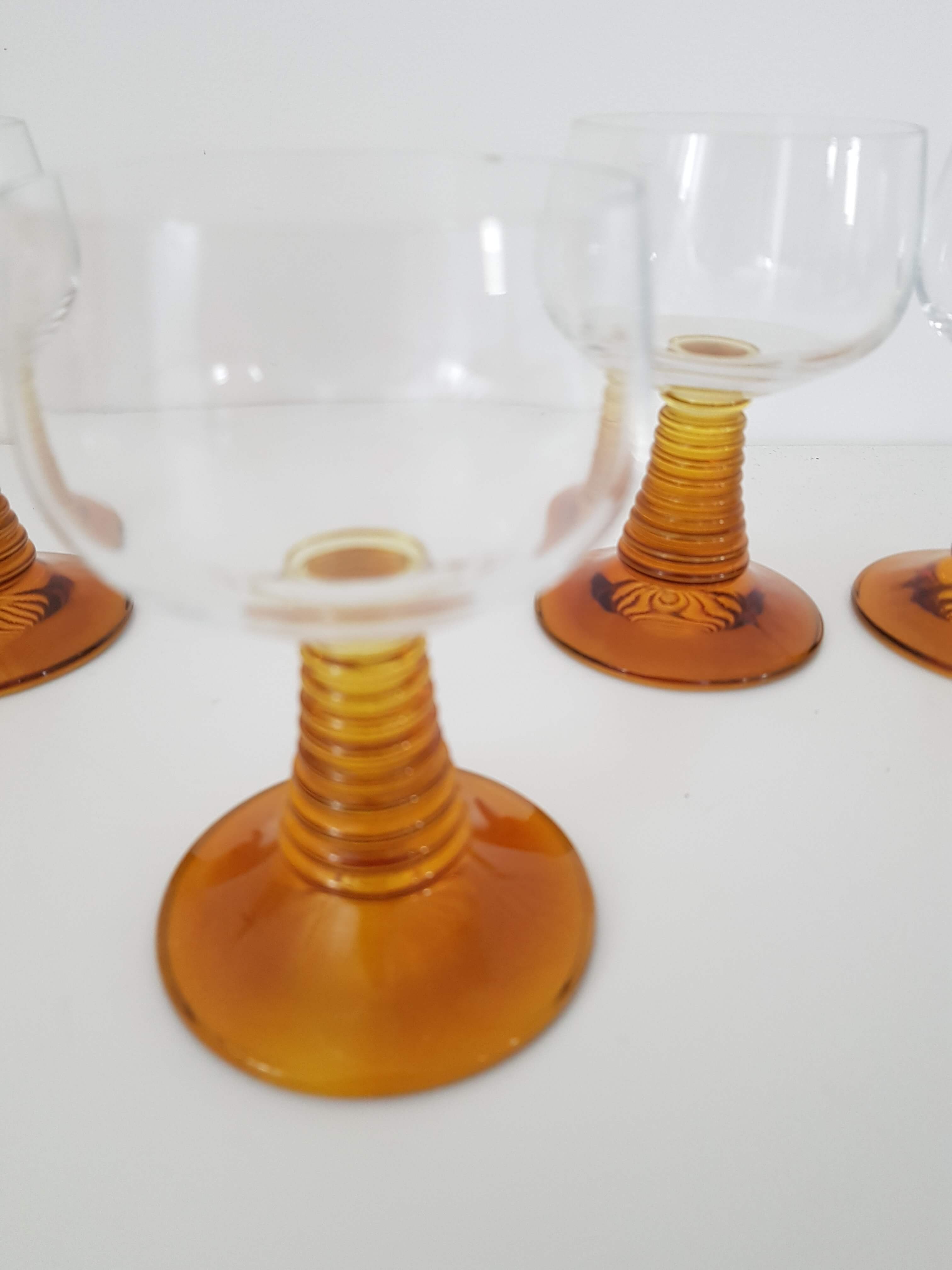 4 vintage foot glasses