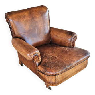 fauteuil club en cuir de mouton anglais ancien avec accoudoirs