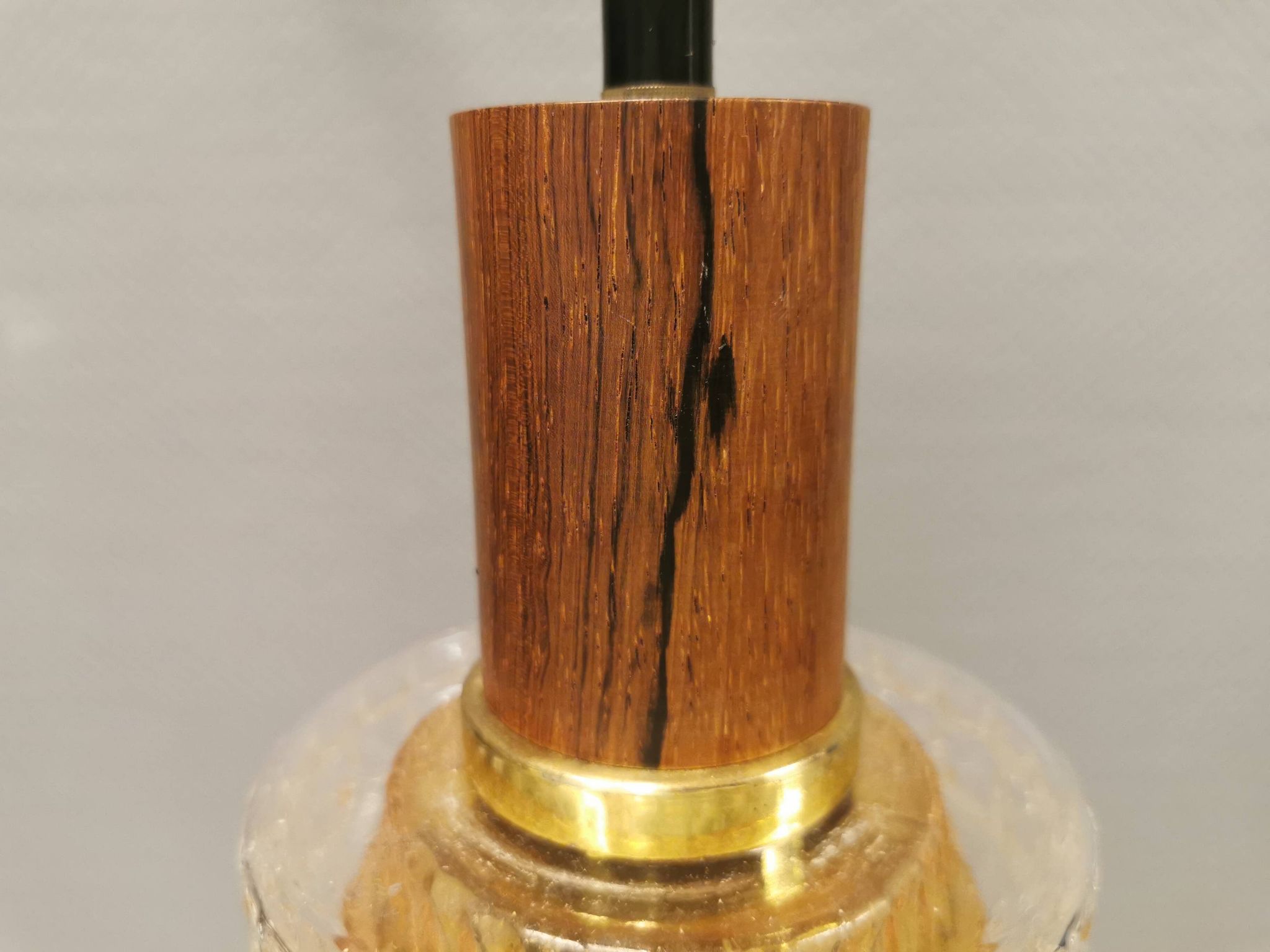 Older Swedish hanging lamp in multi-layered crystal glass with rosewood top and brass ring.