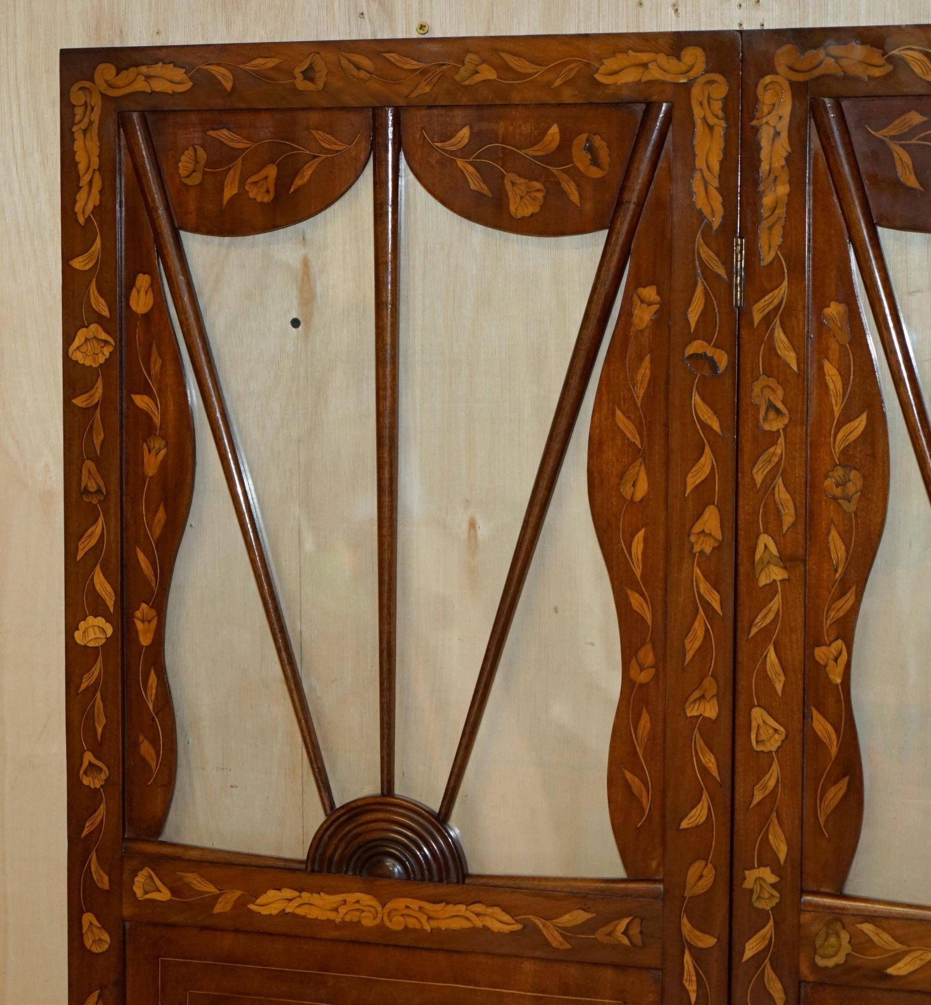 Pair of three-panel screens made of Dutch hardwood and walnut.
