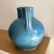 Old oriole in speckled blue glazed stoneware, south-west.