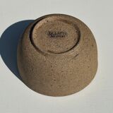 Small brown bowl inside blue and white