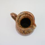Brown speckled stoneware pitcher in very good condition