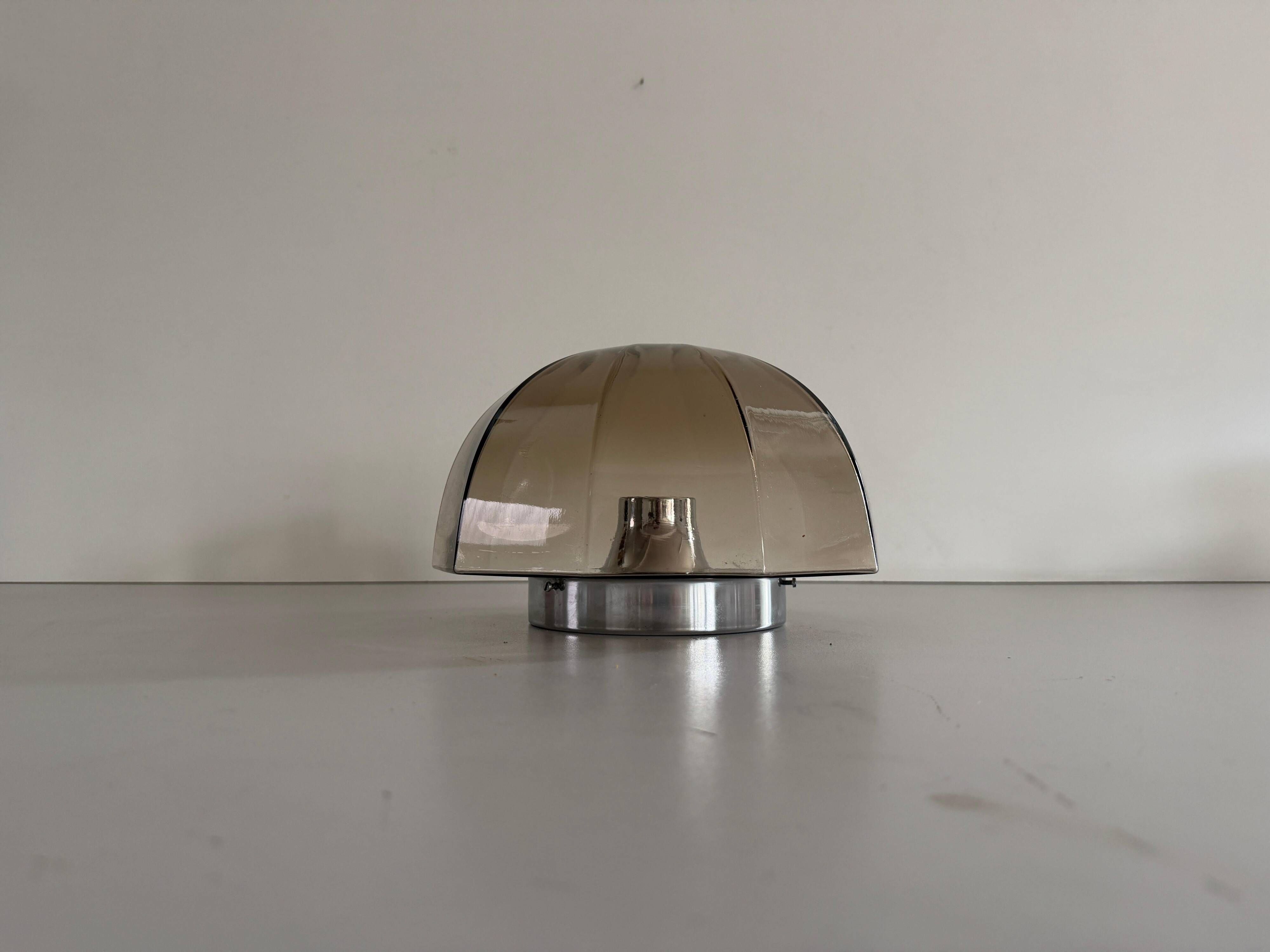Flush-mounted brown glass fixture and metal base by N Leuchten, 1960s, Germany.