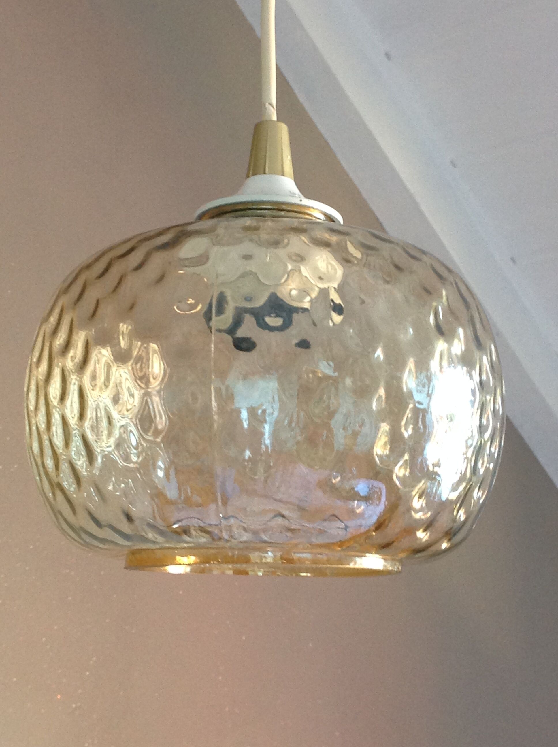 Globe pendant lamp in bubbled amber glass / vintage 60s-70s