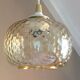 Globe pendant lamp in bubbled amber glass / vintage 60s-70s