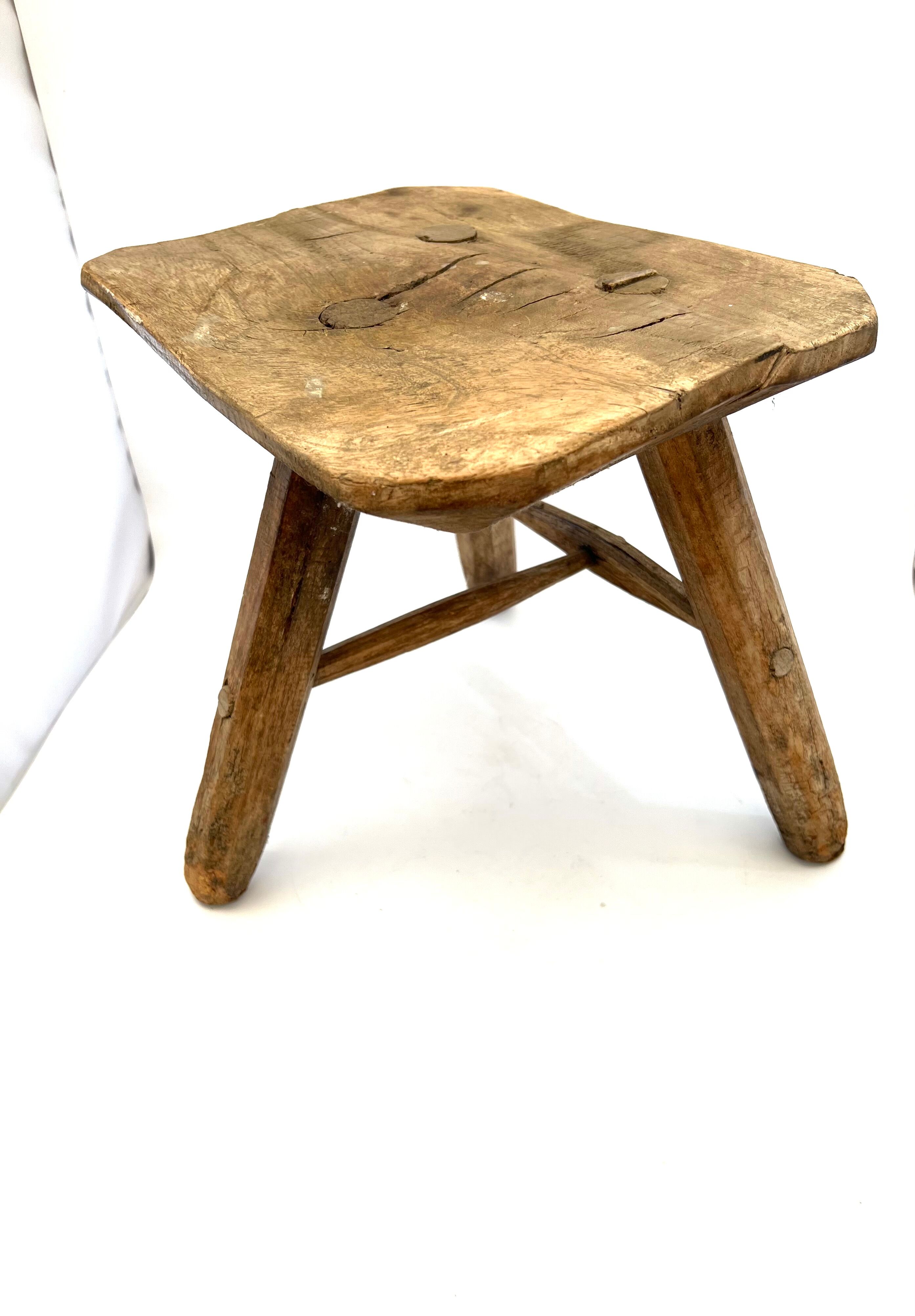 Rustic tripod wood stool