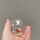 A set of iittala candle holders in clear transparent glass.