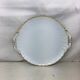 Plat rond ancien de couleur blanc et or blanc avec anses made in france Limoges