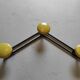 Vintage wall mount in black and yellow metal