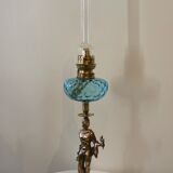 Large kerosene lamp mounted on bronze statue. Late nineteenth century