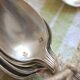 Box of 12 small spoons in vintage silver metal