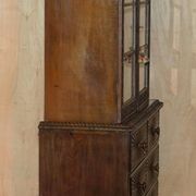 19th-century Anglo-Indian colonial hardwood library on a chest of drawers.