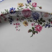 Service plate Bernardaud Limoges porcelain with floral decoration from the 1920s to 1950s.