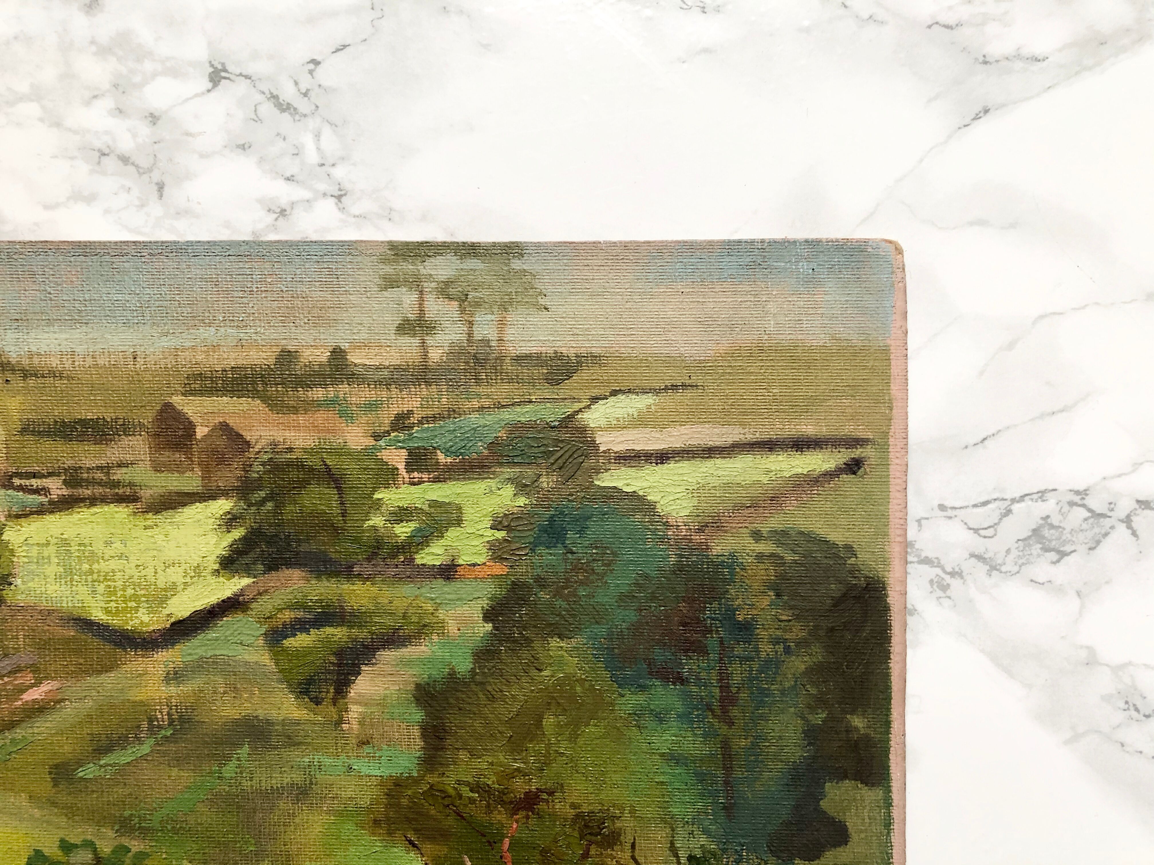 Oil on old cardboard depicting a hilly country landscape