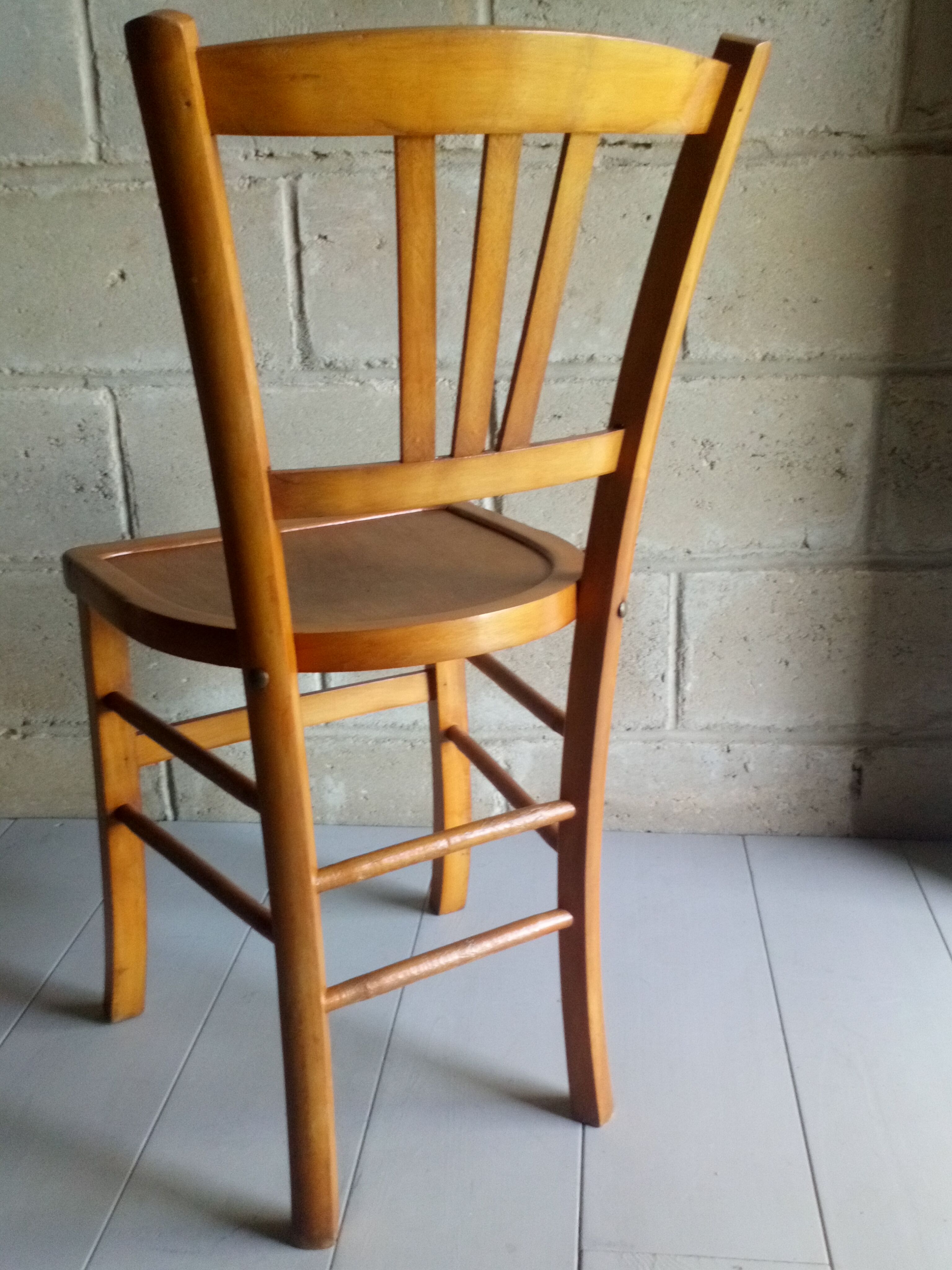 Blond wooden bistot chair from the 50s.