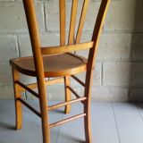 Blond wooden bistot chair from the 50s.
