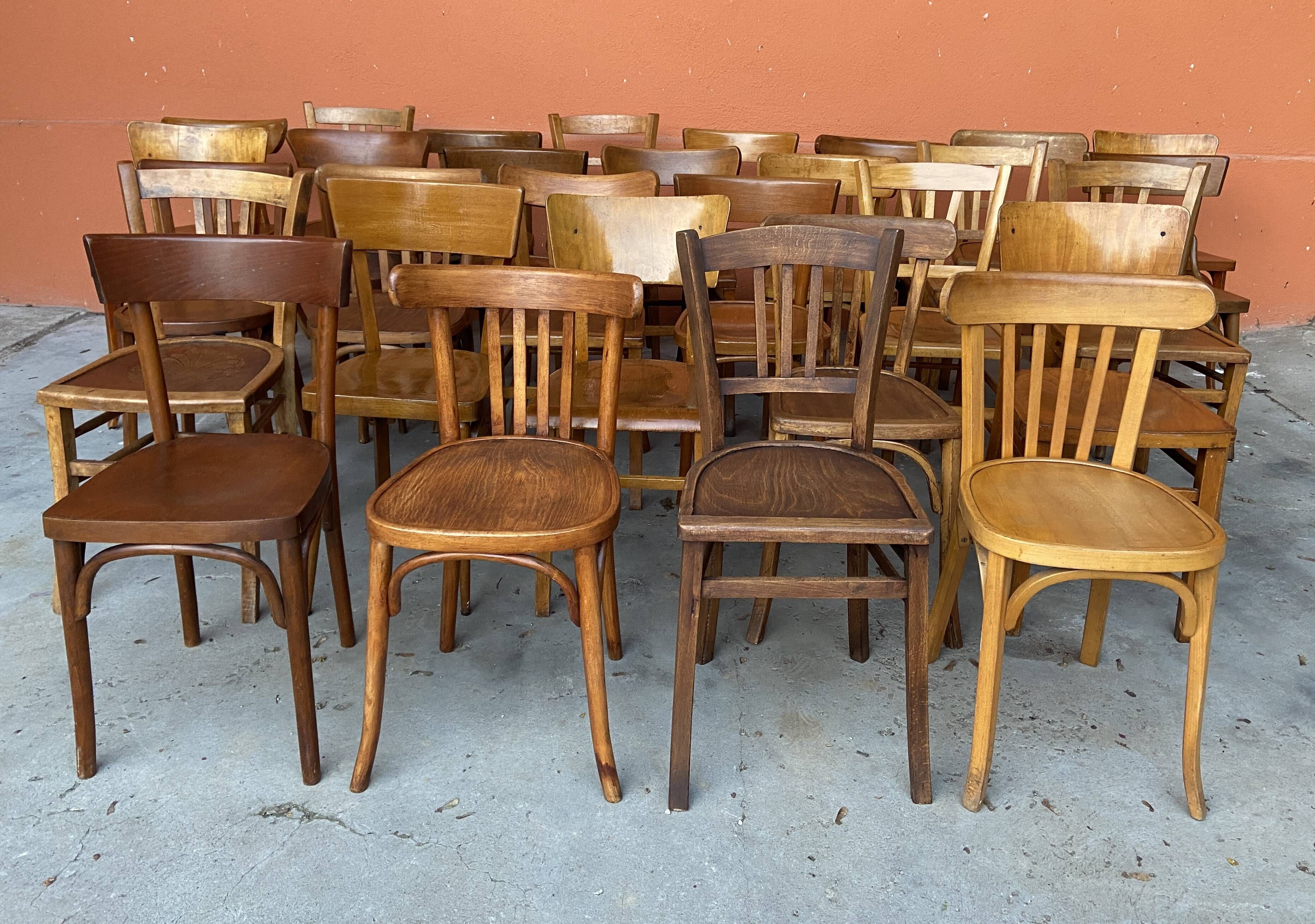 Set of 30 mismatched bistro chairs French Restaurant curved wood