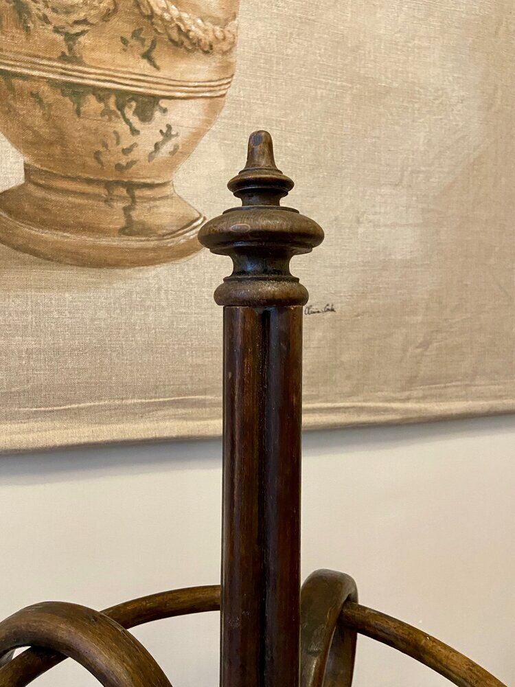 Umbrella holder in arched and dark wood