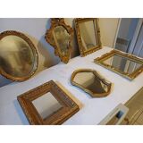 Set of 6 wooden and gilded stucco mirrors