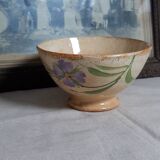 Old bowl in earthenware with floral decoration.