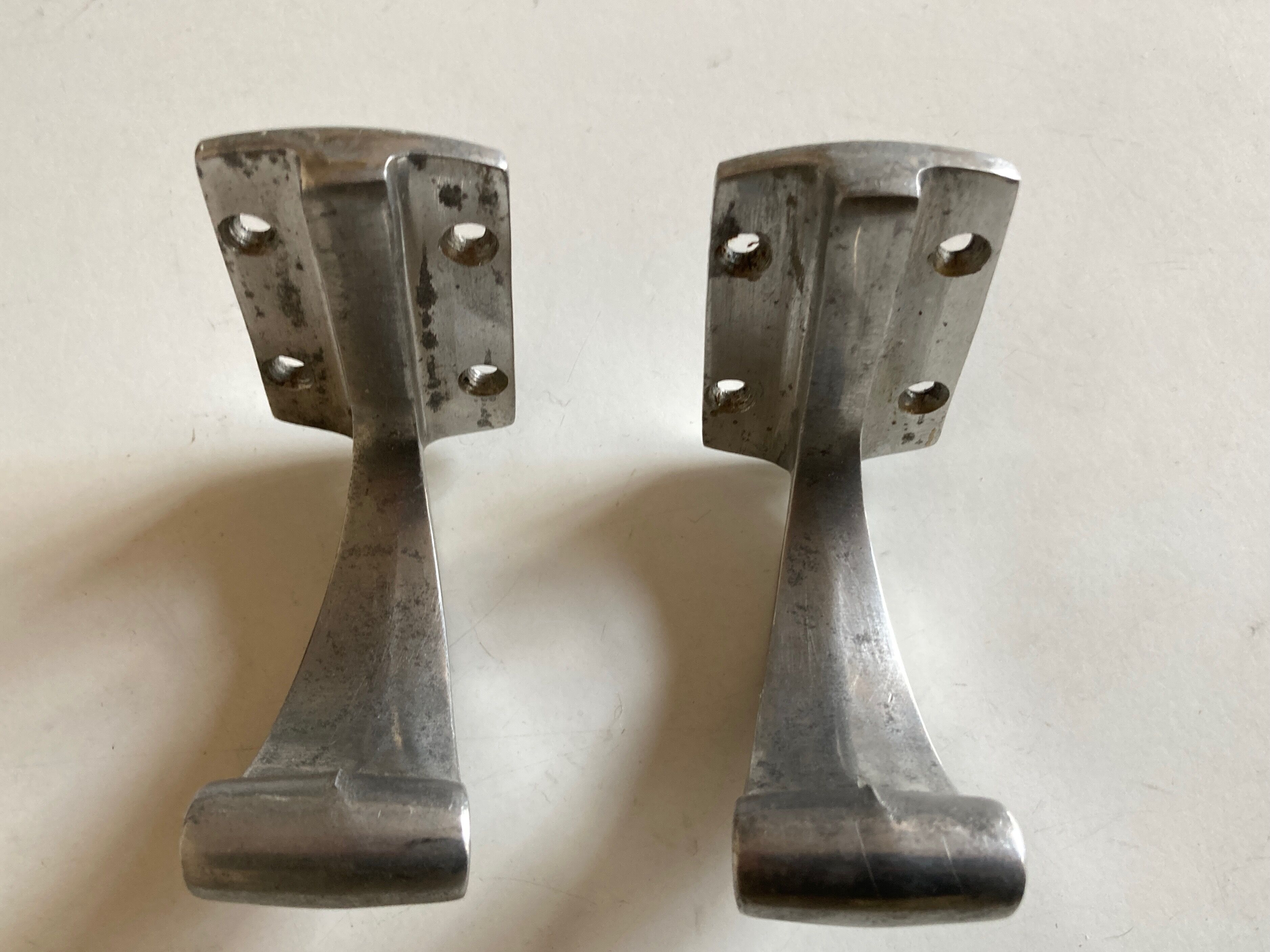 Pair of bathroom pads made of art deco aluminum cast iron