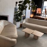 Rounded off-white leather sofa