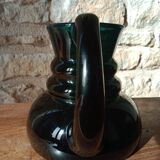 Deep green jug or pitcher with modern design - thick glass