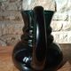 Deep green jug or pitcher with modern design - thick glass