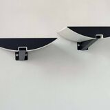 Pair of modernist wall lights, black and white lacquered metal, Italy 1980