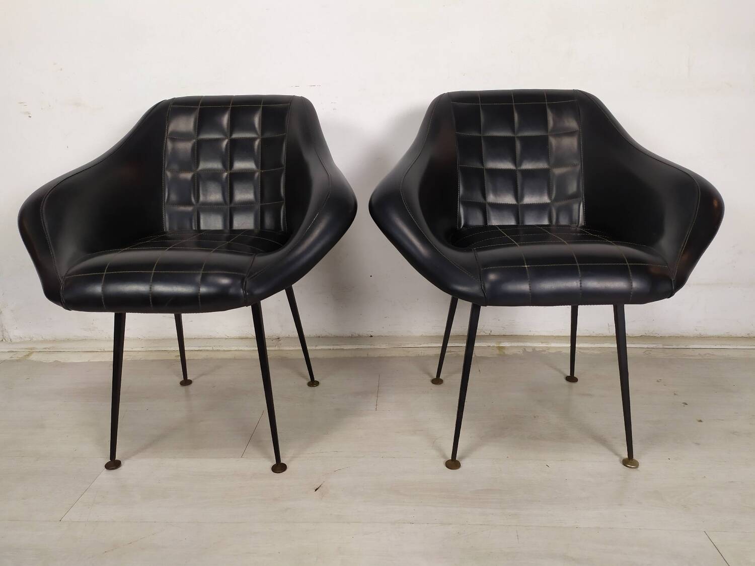 Vintage black skai armchairs