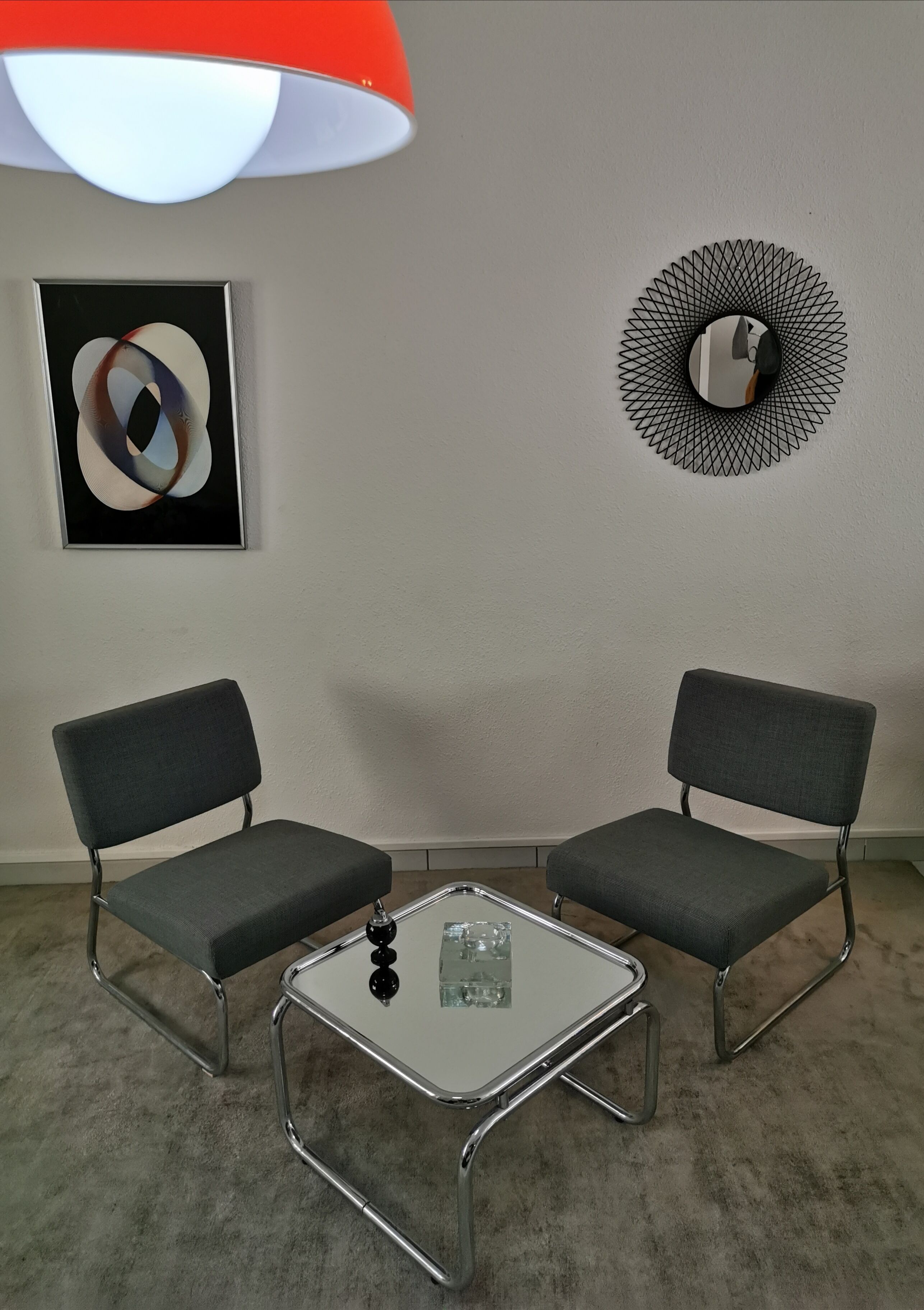 Pair of vintage chrome armchairs and "chicken foot" fabrics