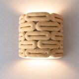 Handcrafted ceramic wall light in raw stoneware inspired by Mid Century design.