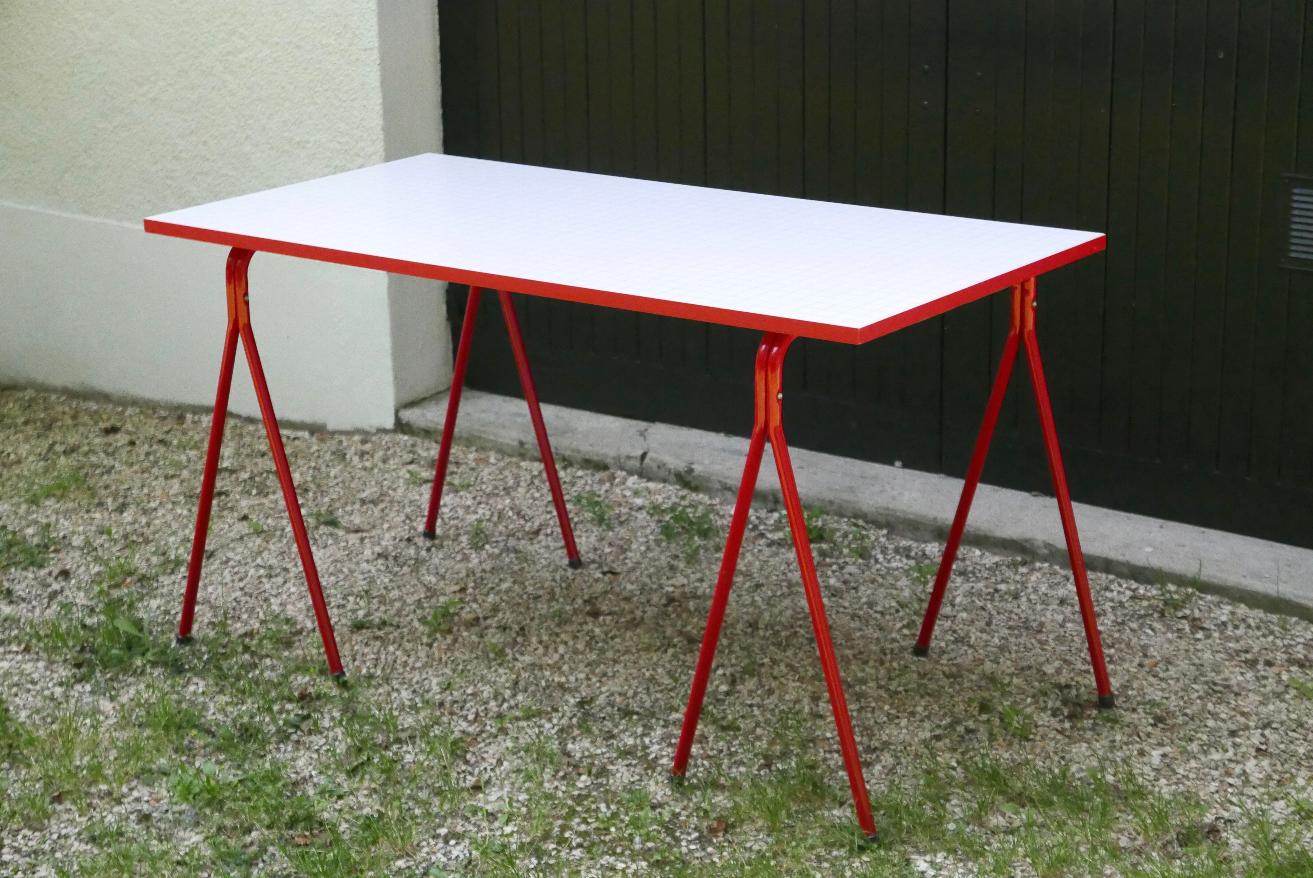 Desk with red trestles, white plaid tray, 80s