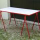 Desk with red trestles, white plaid tray, 80s