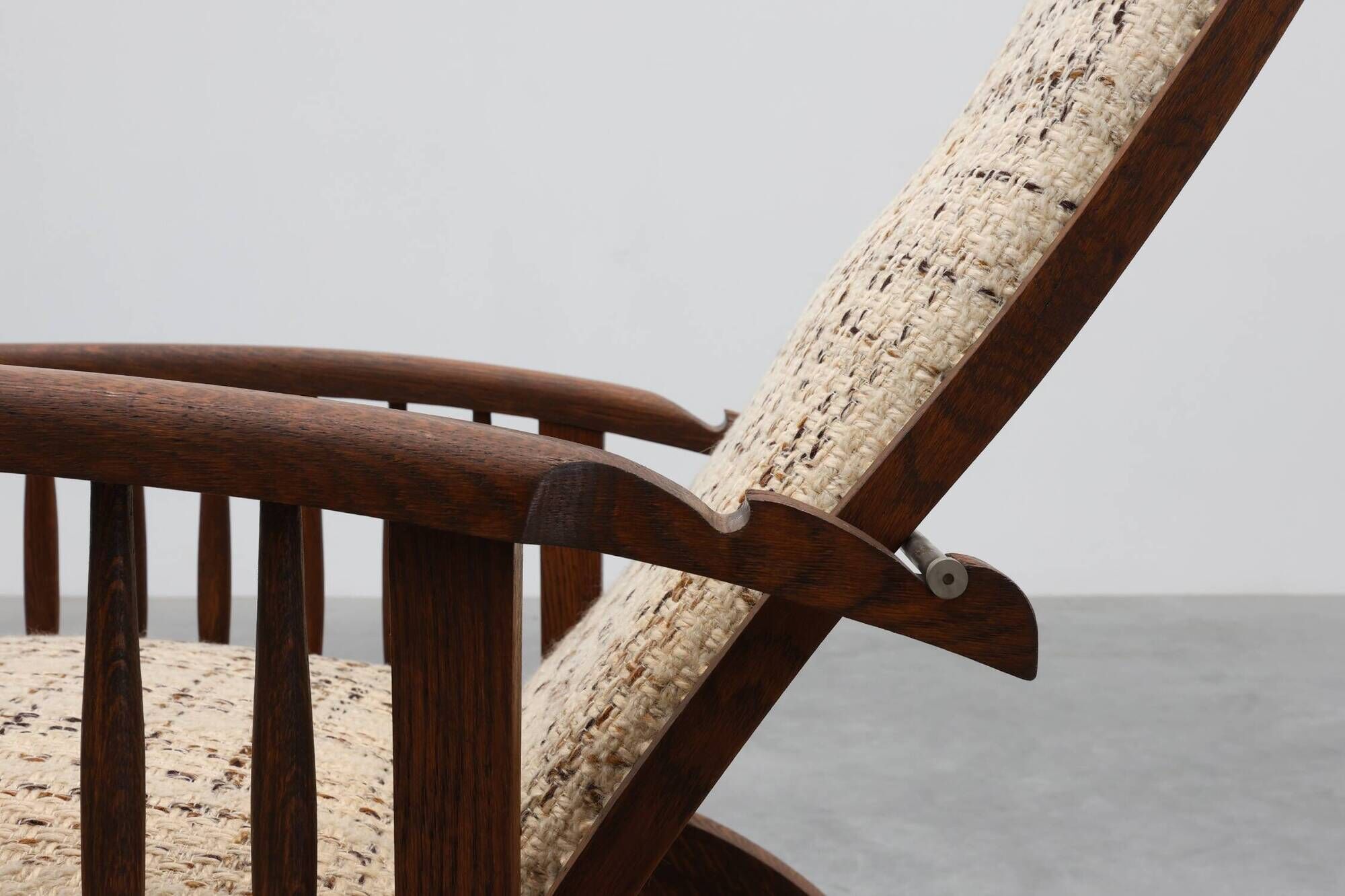 Arts & Craft oak armchair with spindle sides and tweed upholstery, Belgium
