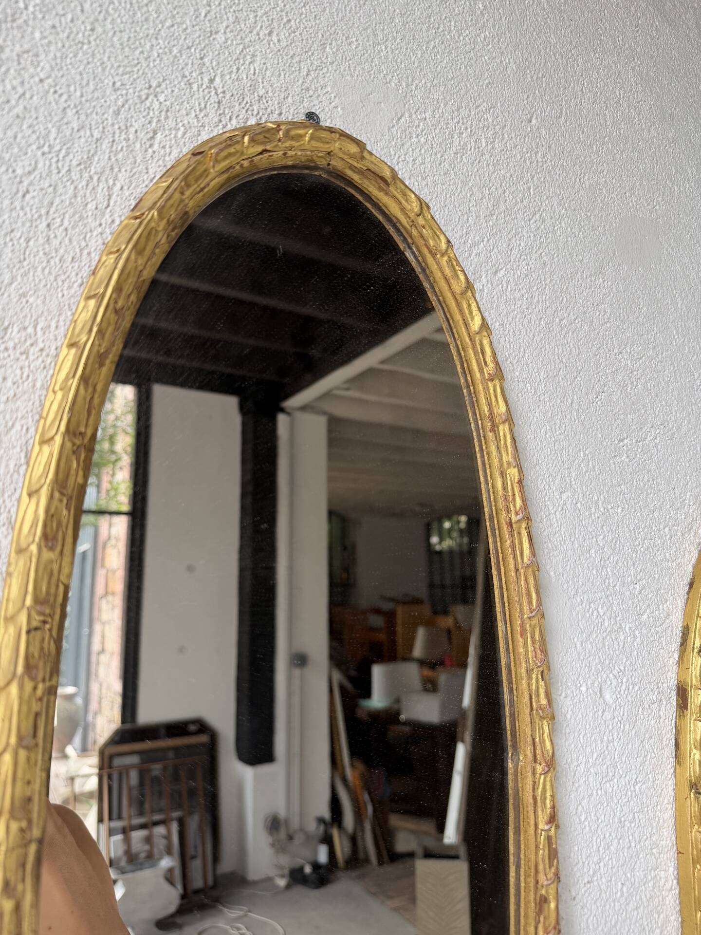 Pair of oval mirrors 1900 gilded stucco