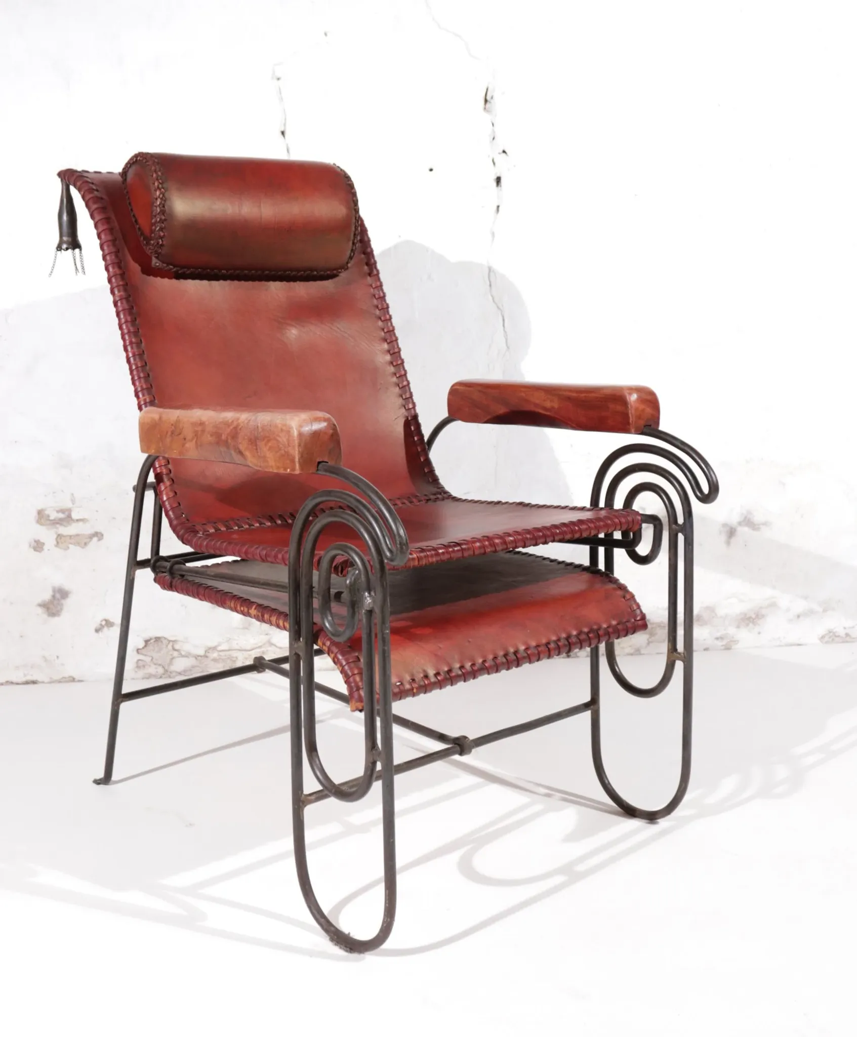 French art deco lounge chair in wrought iron and leather with footrest