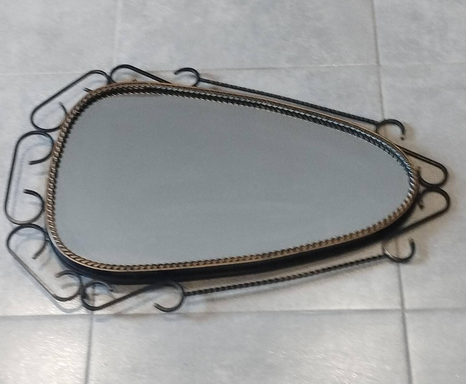 Brutalist antique mirror, sixties era.