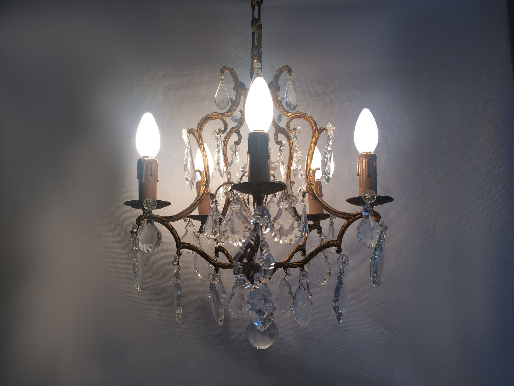 Bronze cage chandelier and glass stamps, at 5 lights. Year 50 60