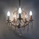 Bronze cage chandelier and glass stamps, at 5 lights. Year 50 60