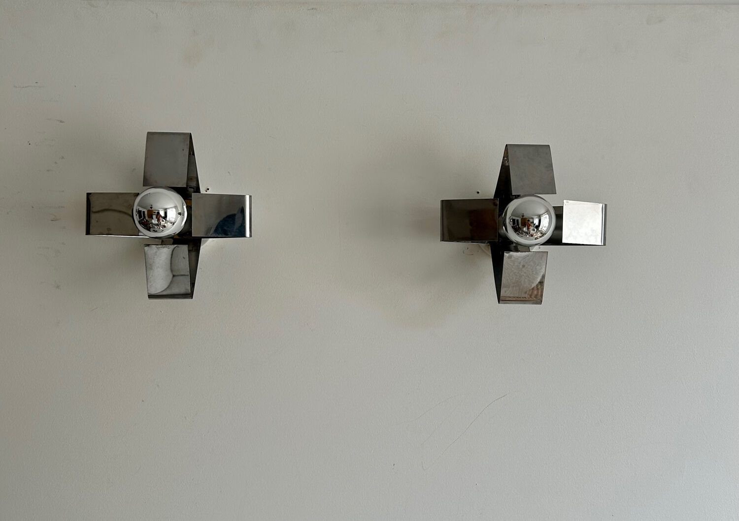 Pair of wall lamps in chromed metal France 1970