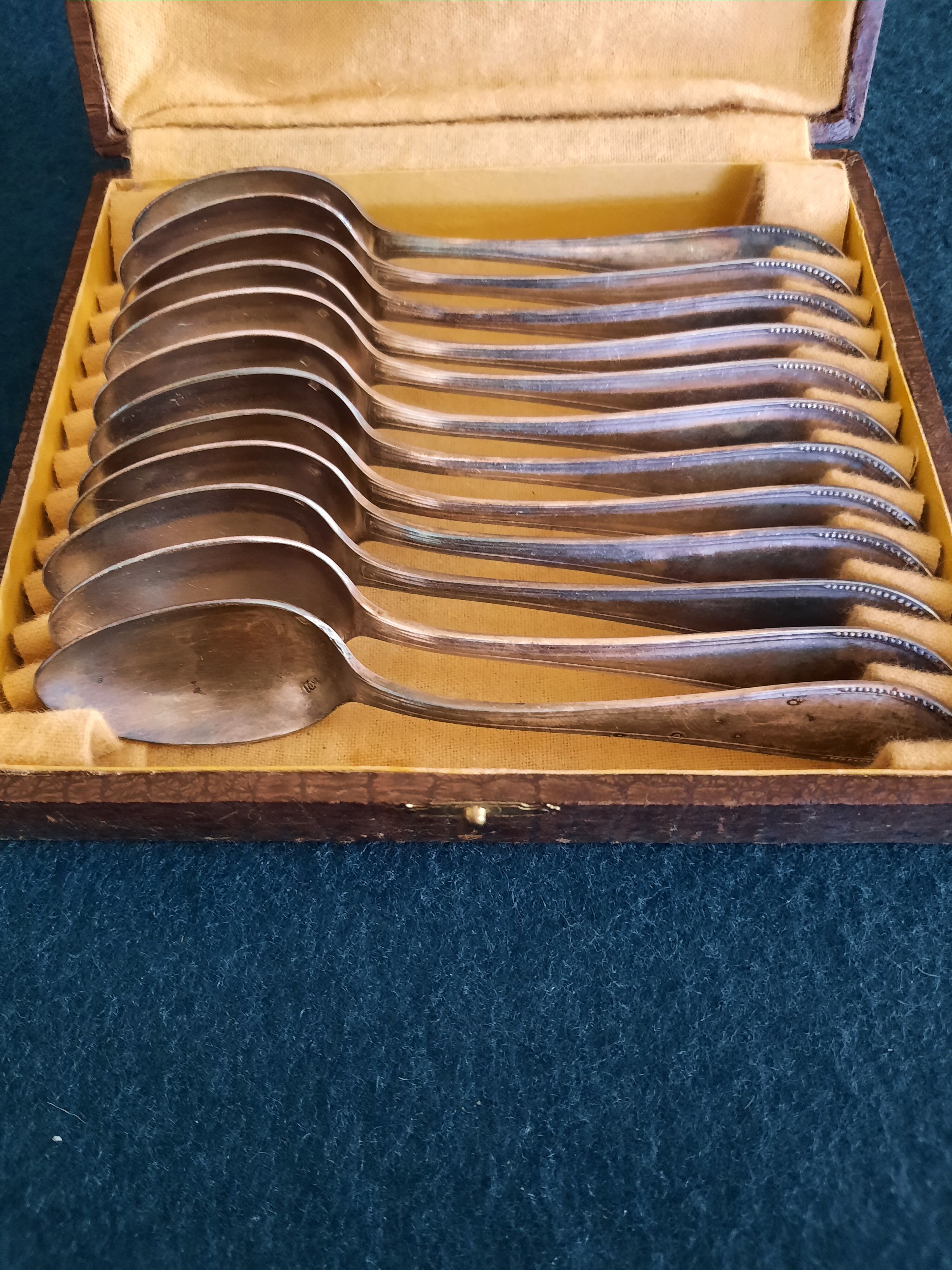 12 teaspoons silver metal