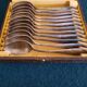 12 teaspoons silver metal