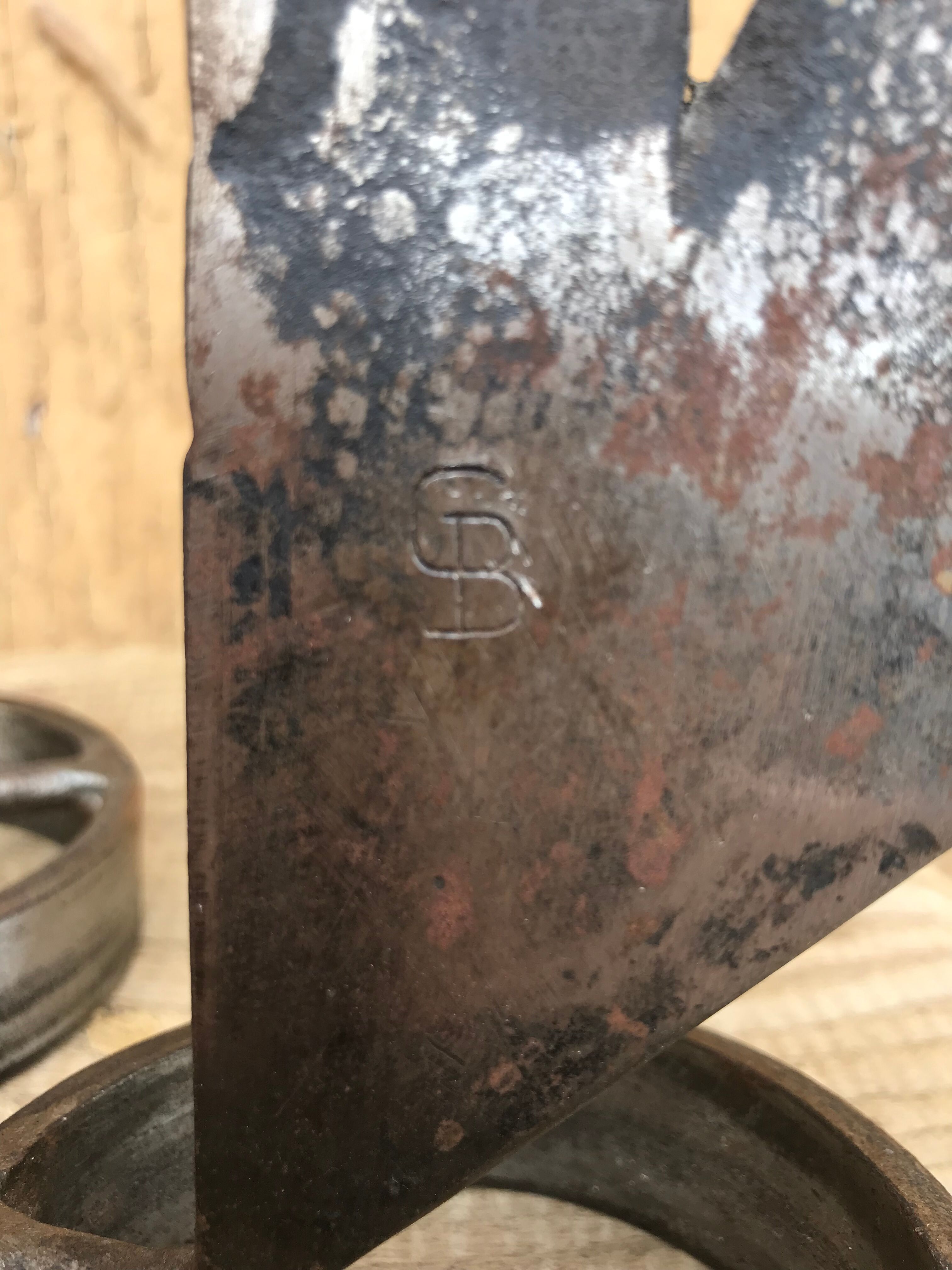 Signed zoomorphic iron candle holders