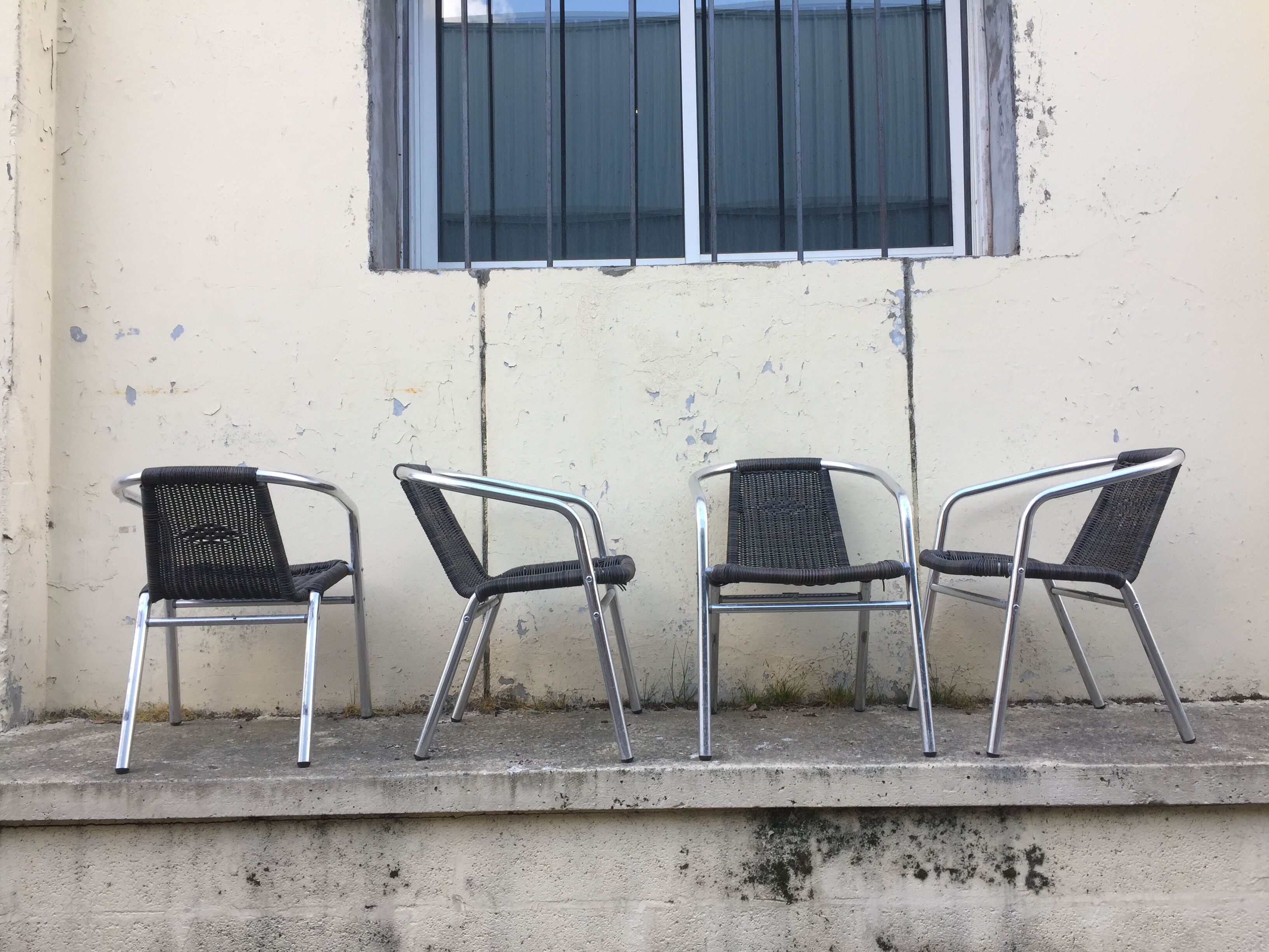 Eight Roland Vlaemynck aluminum coffee terrace armchairs (stackable)