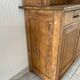 Antique dresser with glass doors and fleur-de-lys from the 50s