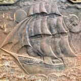Antique cast iron plaque with maritime decoration, 20th century