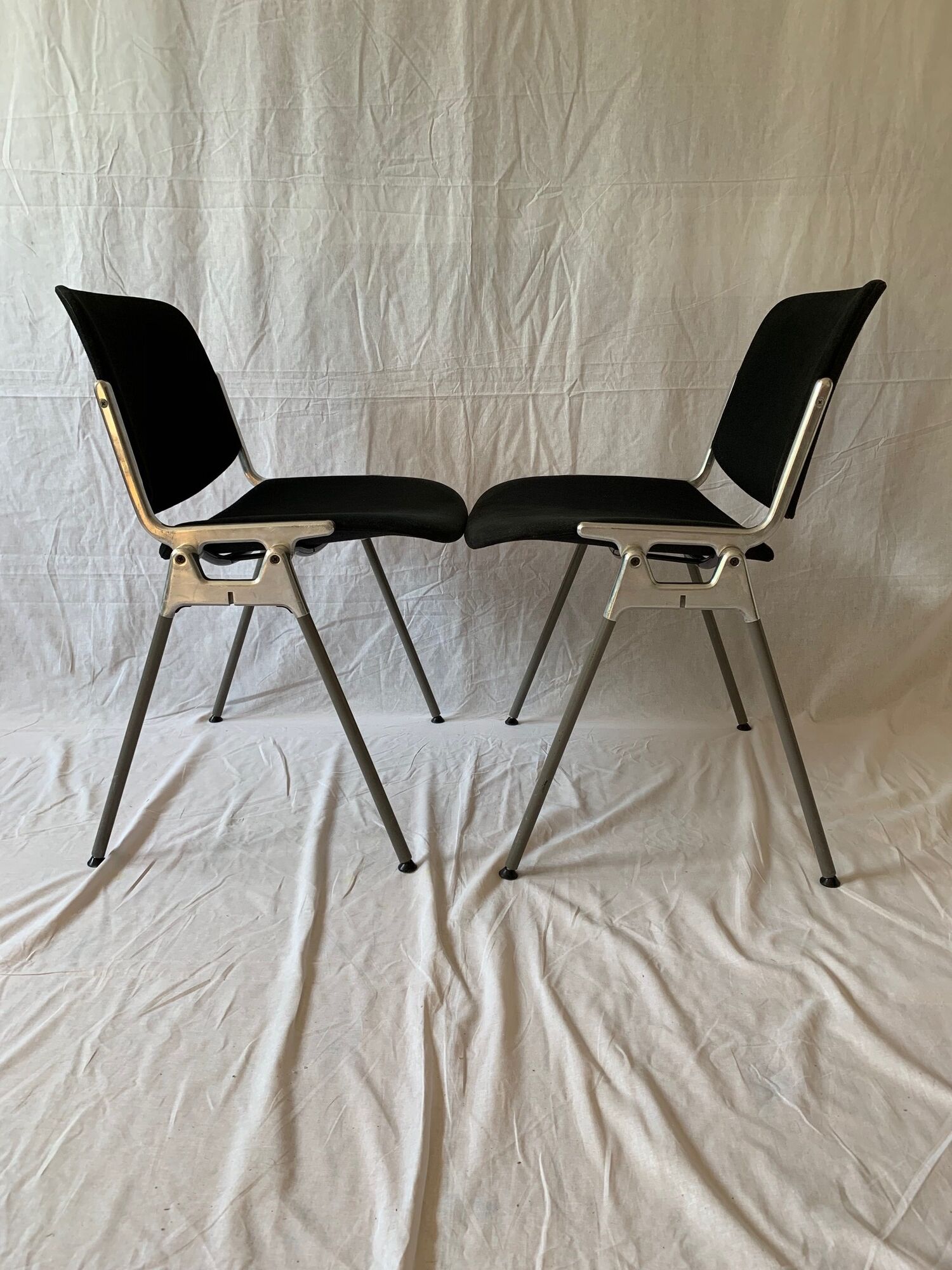 A set of four Castelli DSC 106 chairs, designed by G. Piretti, Italy, 90s