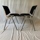 A set of four Castelli DSC 106 chairs, designed by G. Piretti, Italy, 90s